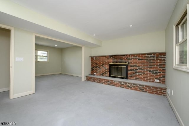 318 Sunnyside Ter, Bridgewater Twp, NJ 08807 - unfurnished living room with recessed lighting, baseboards, carpet, and a fireplace
