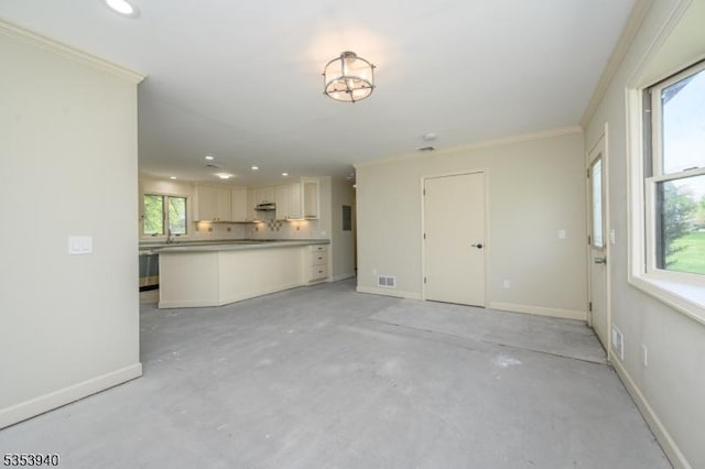 318 Sunnyside Ter, Bridgewater Twp, NJ 08807 - unfurnished living room featuring crown molding, recessed lighting, visible vents, and concrete floors