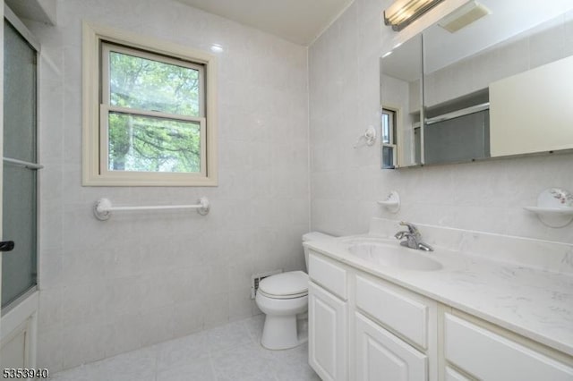318 Sunnyside Ter, Bridgewater Twp, NJ 08807 - bathroom with vanity, a shower with shower door, tile patterned floors, and toilet