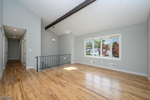 318 Sunnyside Ter, Bridgewater Twp, NJ 08807 - unfurnished room featuring visible vents, baseboards, wood finished floors, and beam ceiling