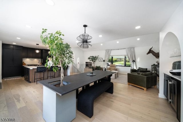 dining area featuring recessed lighting and light wood finished floors