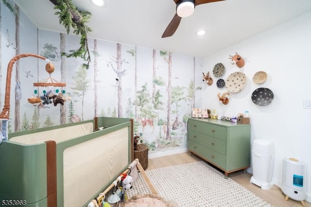 bedroom featuring light wood-style floors, baseboards, a ceiling fan, and recessed lighting