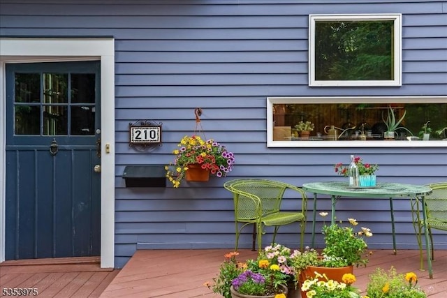 doorway to property with a deck