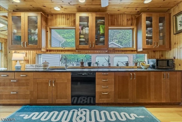 kitchen with dishwasher, stainless steel microwave, wood ceiling, wooden walls, and glass insert cabinets