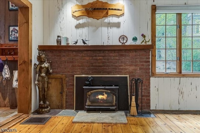 detailed view of wood finished floors and wood walls