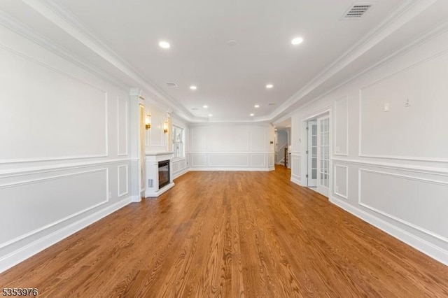 1537 Franklin St, Clark Twp, NJ 07066 - unfurnished living room with a decorative wall, ornamental molding, light wood-style floors, a fireplace, and recessed lighting