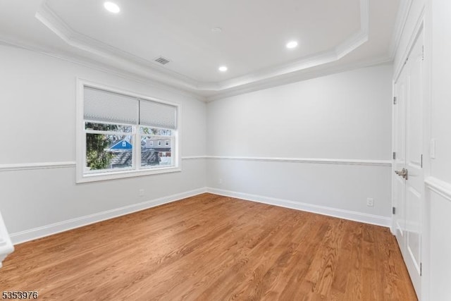 1537 Franklin St, Clark Twp, NJ 07066 - spare room featuring a raised ceiling, ornamental molding, light wood-style flooring, baseboards, and recessed lighting