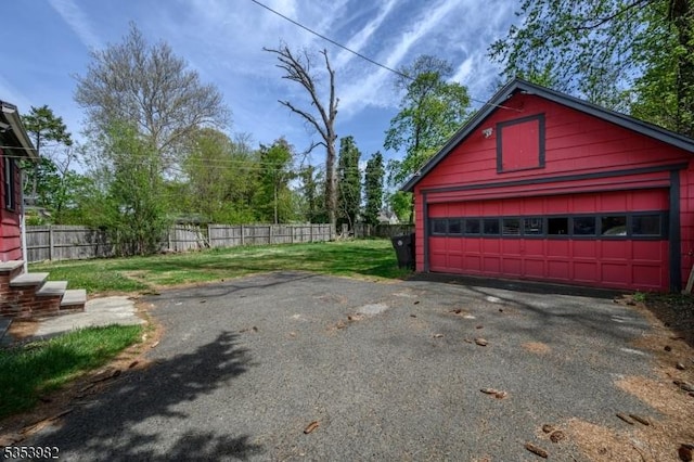 detached garage with fence