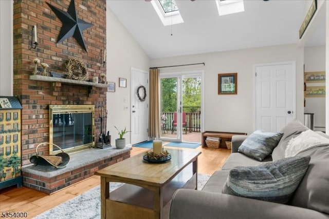 45 Marble Hill Rd, Liberty Twp, NJ 07838 - living room with a skylight, wood finished floors, high vaulted ceiling, and a fireplace