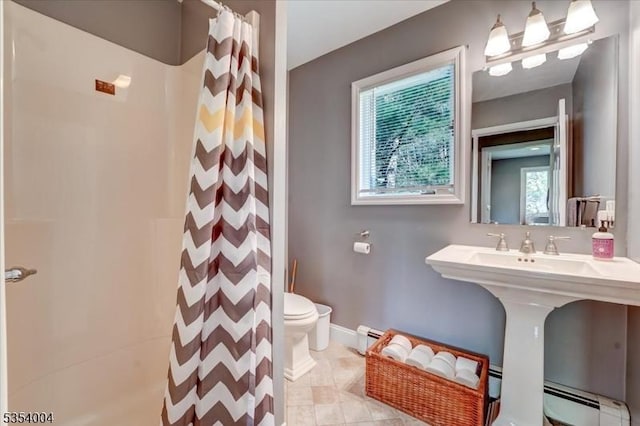 full bath with baseboard heating, toilet, baseboards, a shower with curtain, and a baseboard heating unit