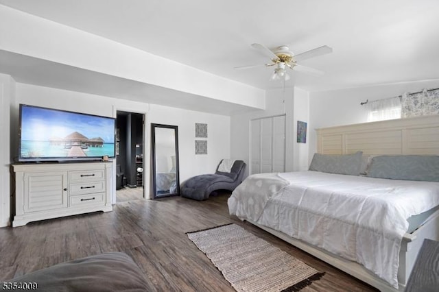bedroom featuring a ceiling fan and wood finished floors