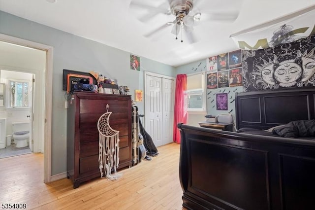 interior space with ceiling fan, a closet, and light wood-type flooring