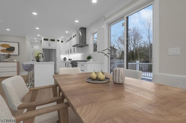 dining space with recessed lighting