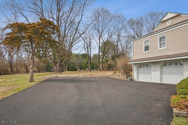 11 Mountain View Dr, Chester Twp, NJ 07930 - view of home's exterior featuring a garage and driveway