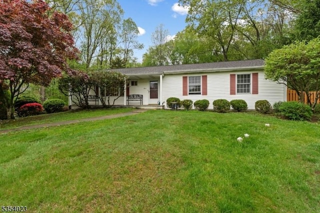ranch-style house with a front yard