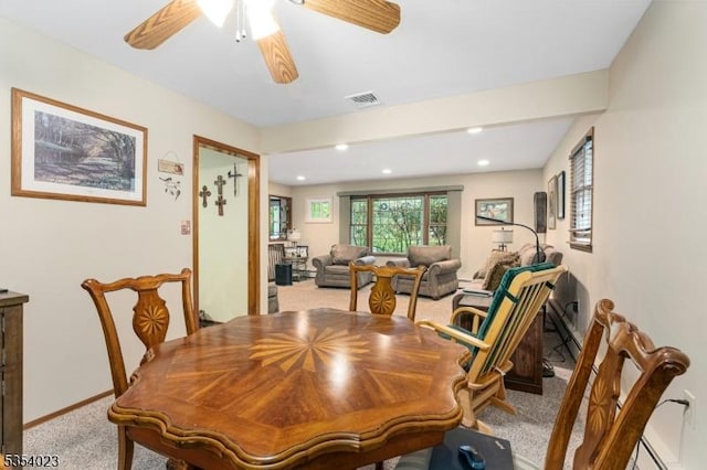 dining space with carpet flooring, ceiling fan, baseboards, and recessed lighting