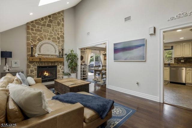 3 F Somerset Hills Ct Unit 3F, Bernardsville Boro, NJ 07924 - living area featuring wood finished floors, healthy amount of natural light, a stone fireplace, high vaulted ceiling, and recessed lighting