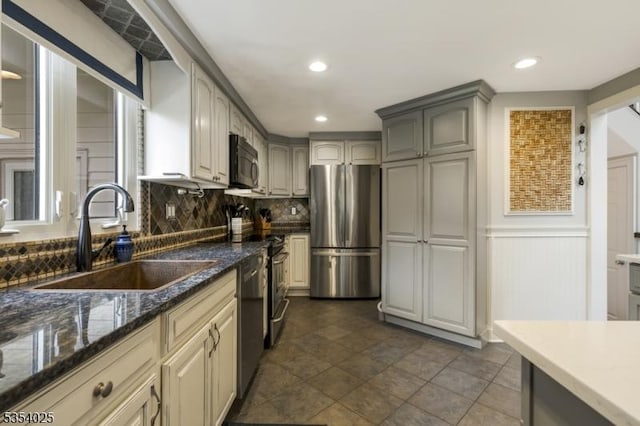 3 F Somerset Hills Ct Unit 3F, Bernardsville Boro, NJ 07924 - kitchen with appliances with stainless steel finishes, dark stone countertops, decorative backsplash, recessed lighting, and wainscoting