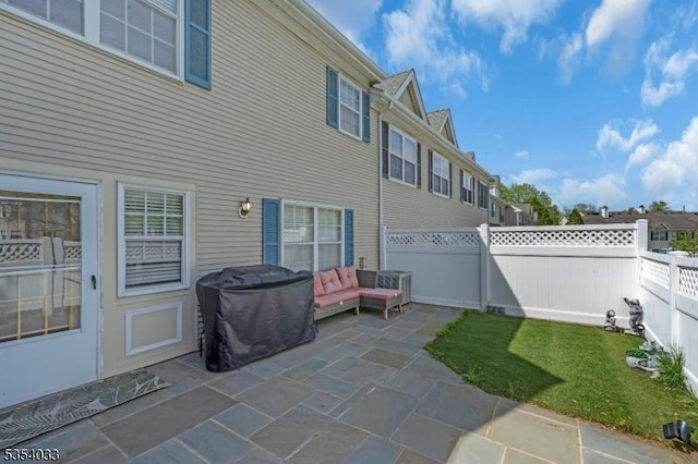 view of patio with a fenced backyard and cooling unit