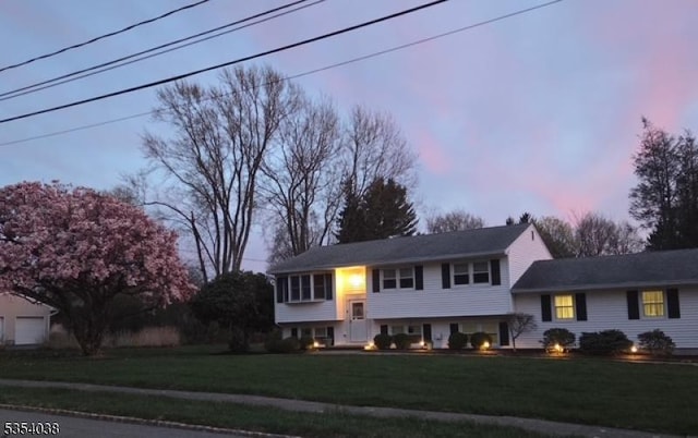 bi-level home featuring a front yard