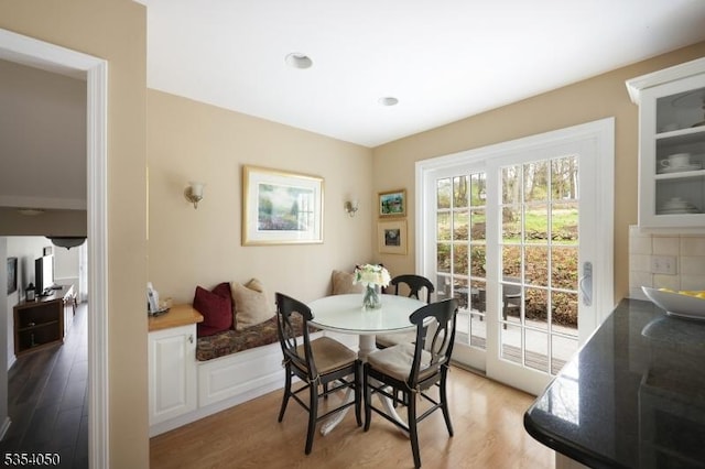 dining area featuring light wood finished floors
