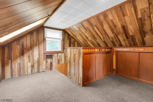 51 Meggins Rd, Rockaway Twp, NJ 07866 - bonus room with lofted ceiling, wood walls, and carpet