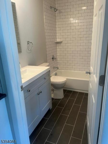 914 S St, Elizabeth City, NJ 07202 - full bathroom with vanity, tile patterned flooring, shower / bath combination, and toilet