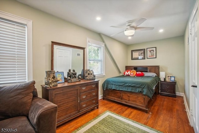 bedroom featuring recessed lighting, baseboards, a ceiling fan, and wood finished floors