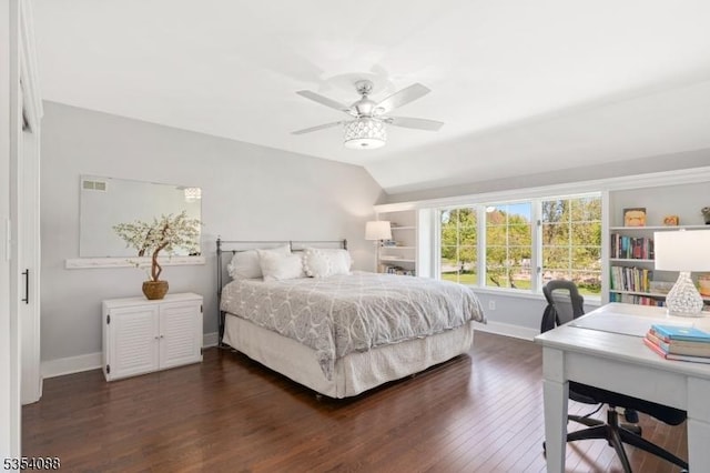 bedroom featuring baseboards, a ceiling fan, dark wood-style flooring, and visible vents
