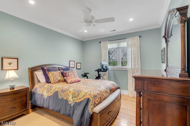 bedroom with ornamental molding, recessed lighting, and light wood-style flooring