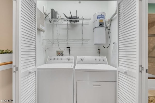 laundry room featuring laundry area and separate washer and dryer