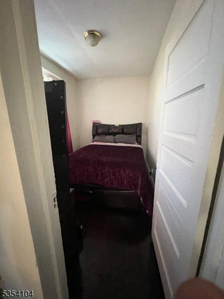 39 Prospect St Unit 4, Bloomfield Twp, NJ 07003 - bedroom featuring dark carpet
