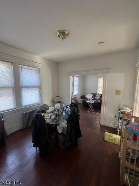 39 Prospect St Unit 4, Bloomfield Twp, NJ 07003 - dining space featuring radiator heating unit and wood finished floors