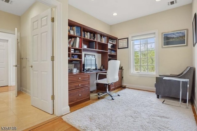 home office featuring recessed lighting, baseboards, visible vents, and light wood finished floors