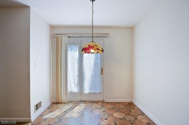 entrance foyer featuring visible vents and baseboards