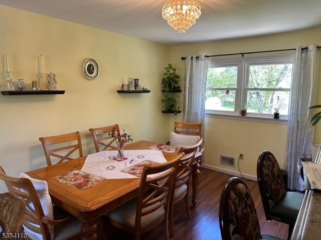 61 Duval St, Bridgewater Twp, NJ 08807 - dining area featuring baseboards, visible vents, a notable chandelier, and dark wood-type flooring