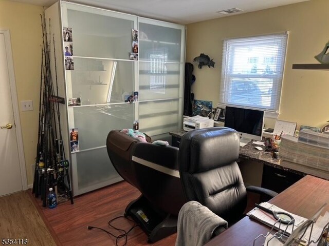 61 Duval St, Bridgewater Twp, NJ 08807 - office area with wood finished floors and visible vents