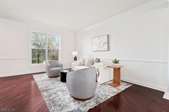 living room with baseboards, ornamental molding, and dark wood-style flooring