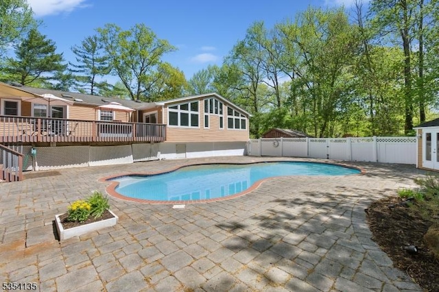 view of pool featuring a patio, fence, and a fenced in pool