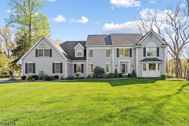 view of front of home with a front yard