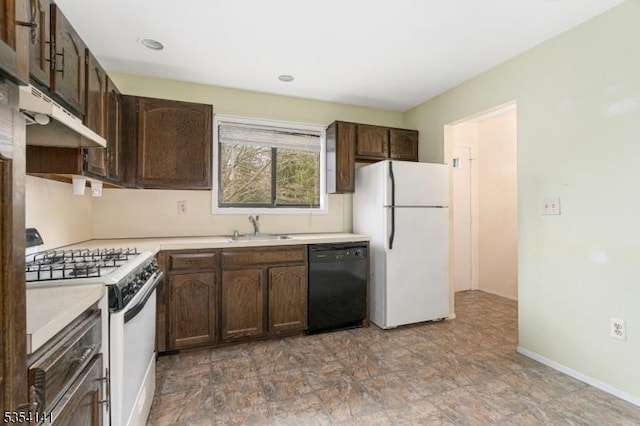 kitchen with a sink, under cabinet range hood, white appliances, and dark brown cabinets