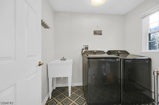 12 Toth Ct, Clifton City, NJ 07014 - laundry room with separate washer and dryer, laundry area, baseboards, and tile patterned floors
