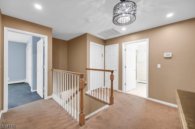 12 Toth Ct, Clifton City, NJ 07014 - corridor featuring visible vents, carpet, baseboards, and an upstairs landing