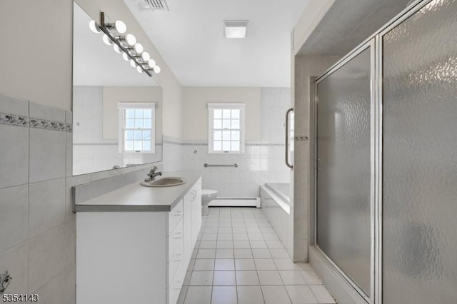 12 Toth Ct, Clifton City, NJ 07014 - bathroom featuring tile patterned flooring, vanity, tile walls, a shower stall, and a baseboard heating unit