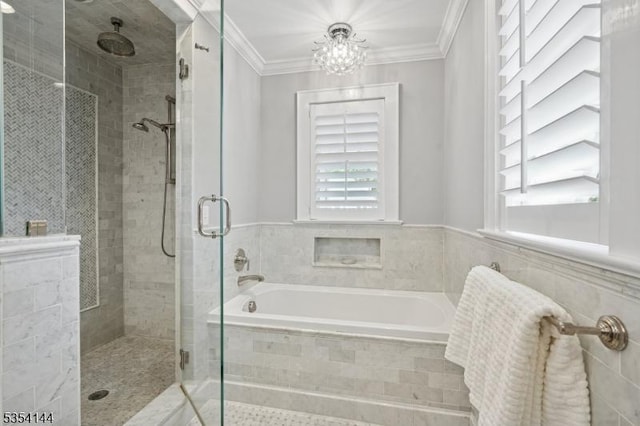 full bath with crown molding, a shower stall, a bath, and a chandelier