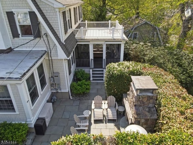exterior space with a patio area and a balcony
