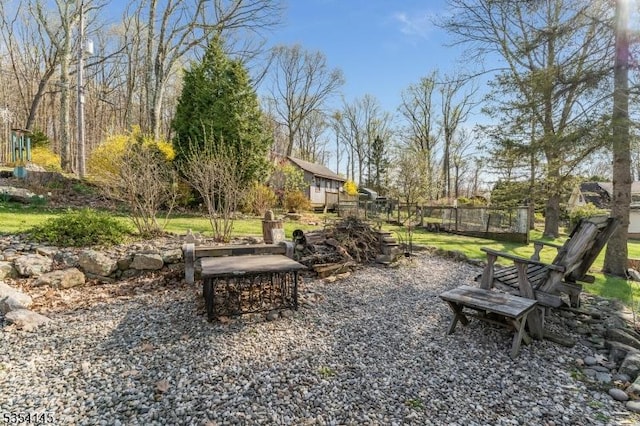 view of property's community with fence