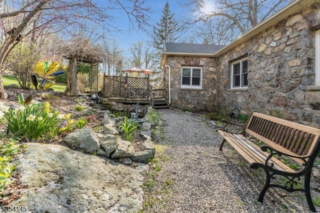 view of yard with a deck