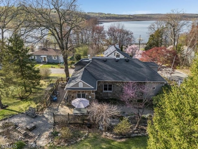drone / aerial view featuring a water view