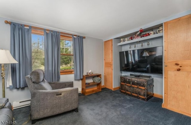 interior space with carpet flooring and baseboard heating